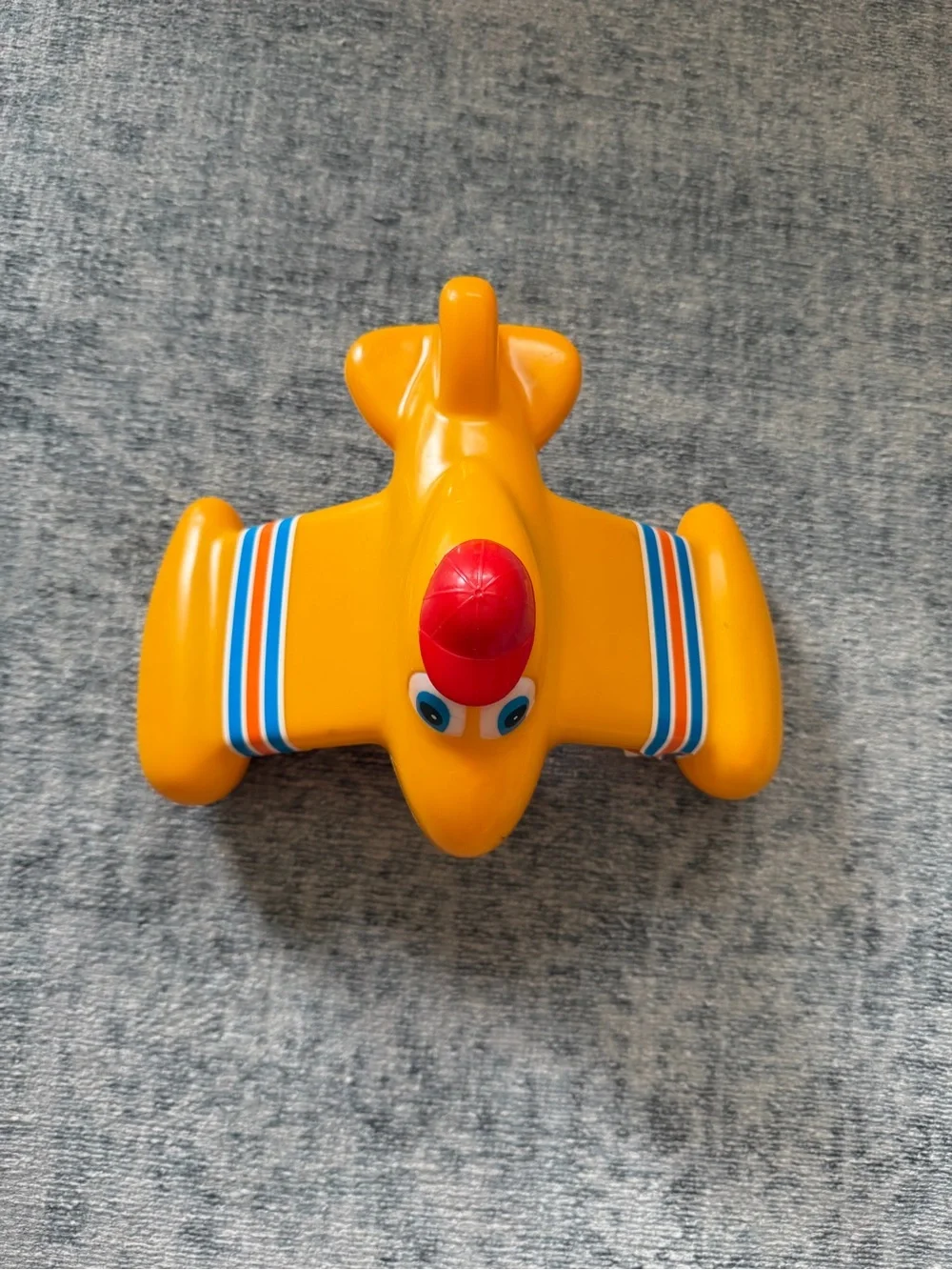 Vintage 1980s airplane toy- red hat and stripes on wings